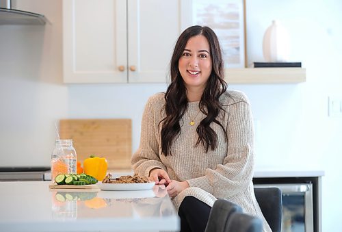 RUTH BONNEVILLE / WINNIPEG FREE PRESS

ENT - side hustle

Portrait of  Ashley Gulakow in her home kitchen where she works as a content creator producing posts on healthy living. 

Story info: Gulakow started a blog in 2018 during her maternity leave. She returned to full-time work as a surgical assistant working in urology and thoracic surgery at HSC and St Boniface in April 2019. A few months later her mother was diagnosed with an aggressive form of breast cancer and passed away in Feb 2020. Her mother&#x573; passing forced Gulakow to reassess her priorities and she started focusing on turning her side income into her fulltime income.  

AV Kitching, Arts &amp; Life writer 

Jan 16th, 2024