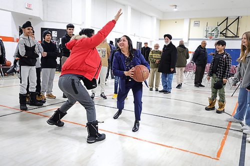 RUTH BONNEVILLE / WINNIPEG FREE PRESS

Standup - basketball fun with Mayor and council members

Devi Sharma, Councillor for Old Kildonan, play a fun, pick-up- game of basketball with students from Arthur E. Wright School after funding  announcement at Maples Community Centre Monday morning.  

Grades 7 &amp; 8 students from Arthur E. Wright School and community members attended the announcement which is awarding renovation grants to 13 community centres in the city including a new gym floor for  Maples Community Centre.

All in attendance:
Mayor Scott Gillingham
Evan Duncan, Chairperson of the Standing Policy Committee on Community Services
Devi Sharma, Councillor for Old Kildonan
Lora Meseman, Executive Director, General Council of Winnipeg Community Centres
 



Jan 22nd 2024
