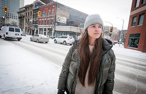 JOHN WOODS / WINNIPEG FREE PRESS
Claire Johnstone, an artist featured in this year&#x2019;s Lights On The Exchange, is photographed on Main St. at Bannatyne Ave. in Winnipeg in front of her lantern Lii Faam Michif Mashkawishiwak pi Tipeemishowak (Metis women are strong and free/own themselves) Monday, January 22, 2024. Her piece depicts Annie Bannatyne, a 19th century Metis woman and philanthropist, and is placed on top of the former Birt&#x2019;s Saddlery building on Main at Bannatyne.

Reporter: Eva