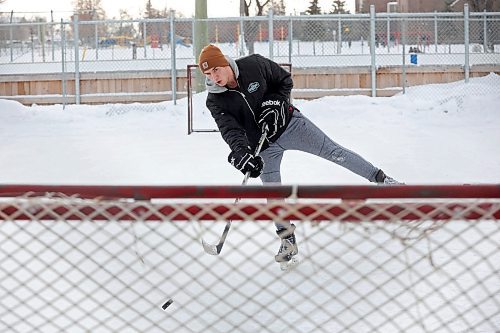 23012024
Kieran Moore takes a shot on a net at the East End Community Centre while practising his hockey skills on a mild and overcast Tuesday. (Tim Smith/The Brandon Sun)