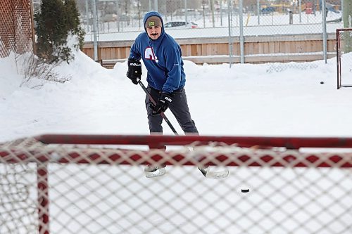 23012024
Adam Guercio takes a shot on a net at the East End Community Centre while practicing his hockey skills with friend Kieran Moore on a mild and overcast Tuesday. 
(Tim Smith/The Brandon Sun)