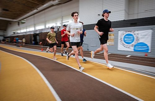 JOHN WOODS / WINNIPEG FREE PRESS
Dawson Mann (600m track), centre, who qualified for the USports national championships this past Saturday, is photographed during training at the University of Manitoba in Winnipeg Tuesday, January 23, 2024.

Reporter: josh