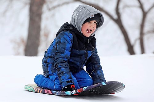 24012024
Five-year-old Kyler (no last name given) sleds at the sugar bowl on 34th Street in Brandon on a mild Wednesday afternoon. Daytime high&#x2019;s in the wheat city are expected to hit plusses by early next week.
(Tim Smith/The Brandon Sun)