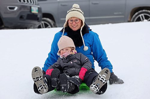24012024
Sherri Ferguson sleds with her granddaughter Camryn Rose, three, at the sugar bowl on 34th Street in Brandon on a mild Wednesday afternoon. Daytime high&#x2019;s in the wheat city are expected to hit plusses by early next week.
(Tim Smith/The Brandon Sun)