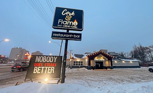 MIKE DEAL / WINNIPEG FREE PRESS
The Cork and Flame at 3106 Portage Avenue early Thursday morning where it has been reported that the owner of restaurant was killed outside the business Wednesday evening.
240125 - Thursday, January 25, 2024.