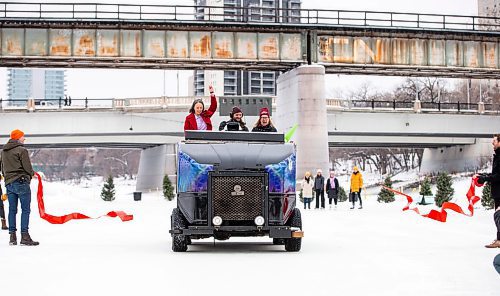 MIKAELA MACKENZIE / WINNIPEG FREE PRESS
	
Sara Stasiuk, president and CEO of The Forks (left), Michael Jordan, river trail manager at The Forks, and LuAnn Lovlin, VP of communications and marketing at The Winnipeg Foundation, officially open the Nestaweya River Trail by driving through the ribbon with an ice resurfacer at The Forks on Thursday, Jan. 25, 2024. For Malak (?) story or standup.
Winnipeg Free Press 2024