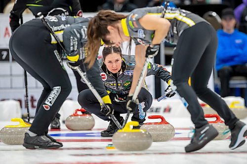 BROOK JONES / WINNIPEG FREE PRESS
Skip Lisa McLeod of Team McLeod from the Portage Curling Club competes in the 2024 Manitoba Women's Curling Championships - Scotties Tournament of Hearts presented by Rocky Mountain Equipment at the Access Event Centre in Morden, Man., Wednesday, Jan. 24, 2024. Members of Team McLeod include third Janelle Lach, second Hallie McCannell, lead Jolene Callum and alternate Hailey McFarlane. Pictured: McLeod calling the line during her team's match against Team Cameron from the Granit Curling Club Wednesday, Jan. 24, 2024. Kater Cameron is pictured in standing behind and to the right of McLeod. Pictured: McLeod (middle) calling the line while lead McFarlane (left) and third Lach (right) sweep ahead of the rock during her team's match against Team Cameron from the Granit Curling Club Wednesday, Jan. 24, 2024.