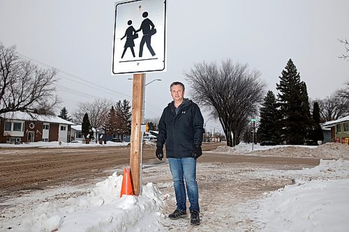 25012024
Brandon Ward 5 City Councillor Greg Hildebrand at the intersection of Richmond Avenue at 22nd Street on Thursday. Hildebrand has been pushing for crosswalk improvements at the intersection as well as the crosswalk on Richmond Avenue by Sobey&#x2019;s just west of 18th Street.  
(Tim Smith/The Brandon Sun)