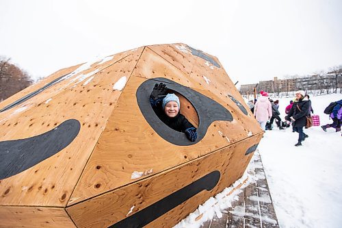 MIKAELA MACKENZIE / WINNIPEG FREE PRESS
	
cole St. Avila School student Jesse L. (11) explores the new 2024 warming hut Murky Waters with the rest of his grade five/six class at The Forks on Friday, Jan. 26, 2024. For photo page.
Winnipeg Free Press 2024