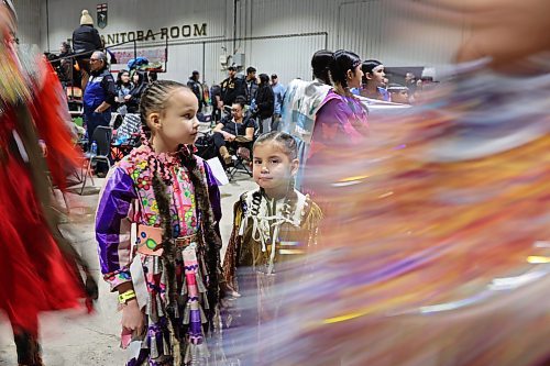 26012024
Young dancers line up to take part in the Powwow Grand Entry at the Dakota Nation Winterfest at the Keystone Centre on Friday evening. The weekend-long Winterfest includes square dancing, Moccasin games, basketball, volleyball and a variety of other events.
(Tim Smith/The Brandon Sun)
