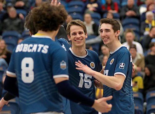 Brandon University Bobcats Philipp Lauter (15) and Riley Grusing celebrate a point against the UBC Okanagan Heat in Canada West men's volleyball action at the Healthy Living Centre on Friday. (Thomas Friesen/The Brandon Sun)
