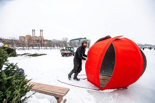 MIKAELA MACKENZIE / WINNIPEG FREE PRESS
	
Michael Jordan, river trail manager at The Forks, pushes the new 2024 warming hut Spinning Dim Sum out onto the ice (for folks to interact with) at The Forks on Friday, Jan. 26, 2024. For photo page.
Winnipeg Free Press 2024