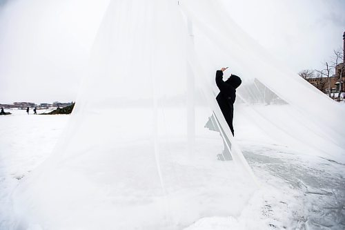 MIKAELA MACKENZIE / WINNIPEG FREE PRESS
	
Co-designer Francisco Silva takes a photo in the new 2024 warming hut Sublimation at The Forks on Friday, Jan. 26, 2024. For photo page.
Winnipeg Free Press 2024