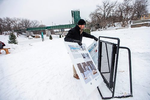 MIKAELA MACKENZIE / WINNIPEG FREE PRESS
	
Zach Peters puts signage up for the new 2024 warming huts at The Forks on Friday, Jan. 26, 2024. For photo page.
Winnipeg Free Press 2024