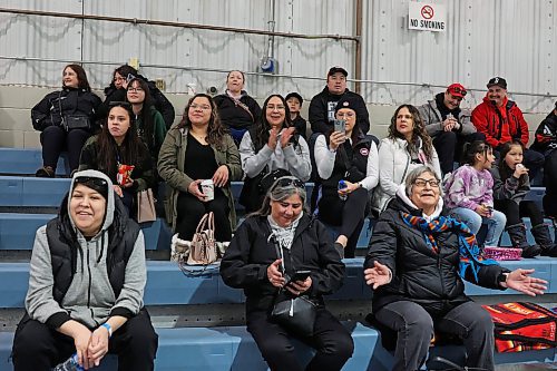 26012024
Family members watch as Sandy Bay takes on Minegoziibi in hockey action during the Dakota Nation Winterfest at the Keystone Centre on Friday. The weekend-long Winterfest includes Powwow, Moccasin games, basketball, volleyball and a variety of other events.
(Tim Smith/The Brandon Sun)
