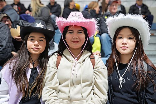 26012024
Senaya Thompson, Alix Lafrenirere and Shaylene McKay watch as Sandy Bay takes on Minegoziibi in hockey action during the Dakota Nation Winterfest at the Keystone Centre on Friday. The weekend-long Winterfest includes Powwow, Moccasin games, basketball, volleyball and a variety of other events.
(Tim Smith/The Brandon Sun)
