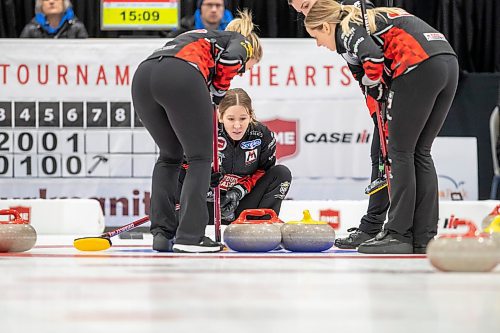 BROOK JONES / WINNIPEG FREE PRESS
Team Lawes from the Fort Rouge Curling Club competes in the 2024 Manitoba Women's Curling Championships - Scotties Tournament of Hearts presented by Rocky Mountain Equipment at the Access Event Centre in Morden, Man., Friday, Jan. 26, 2024. Members of Team Lawes also include third Selena Njejovan, second Jocelyn Peterman and lead Kristin MacCuish. Pictured: Lawes (second from far left) watches the shot and the line with her teammates MacCuish (left), Njegovan (second from far left) and Peterman (far right) during her team's match against Team Peterson from the Assiniboine Memorial Curling Club Friday, Jan. 26, 2024. Team Lawes earned an 8-6 victory over Team Peterson.