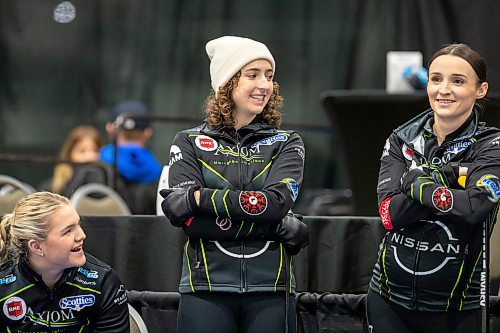 BROOK JONES / WINNIPEG FREE PRESS
Alternate Mackenzie Zacharais (middle) is pictured with teammates third Meghan Walter (left) and second Taylor McDonald (right) fom team Cameron from the Granit Curling Club at the 2024 Manitoba Women's Curling Championships - Scotties Tournament of Hearts presented by Rocky Mountain Equipment at the Access Event Centre in Morden, Man., Friday, Jan. 26, 2024. Members of Team Cameron also include Skip Kate Cameron and lead Mackenzie Elias.