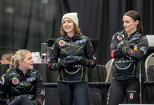 BROOK JONES / WINNIPEG FREE PRESS
Alternate Mackenzie Zacharais (middle) is pictured with teammates third Meghan Walter (left) and second Taylor McDonald (right) from team Cameron from the Granit Curling Club at the 2024 Manitoba Women's Curling Championships - Scotties Tournament of Hearts presented by Rocky Mountain Equipment at the Access Event Centre in Morden, Man., Friday, Jan. 26, 2024. Members of Team Cameron also include Skip Kate Cameron and lead Mackenzie Elias.