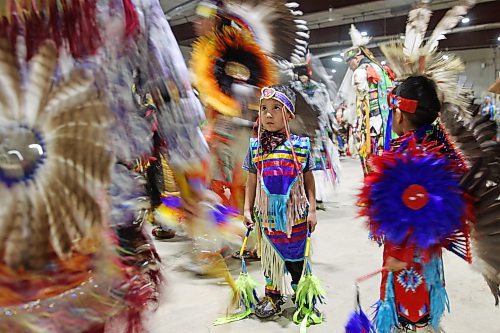 26012024
A young boy watches as other dancers take part in the Powwow Grand Entry at the Dakota Nation Winterfest at the Keystone Centre on Friday evening. The weekend-long Winterfest includes square dancing, Moccasin games, basketball, volleyball and a variety of other events.
(Tim Smith/The Brandon Sun)
