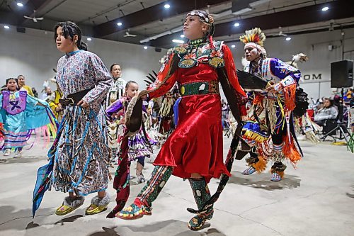 26012024
Dancers take part in the Powwow at the Dakota Nation Winterfest at the Keystone Centre on Friday evening. The weekend-long Winterfest includes square dancing, Moccasin games, basketball, volleyball and a variety of other events.
(Tim Smith/The Brandon Sun)
