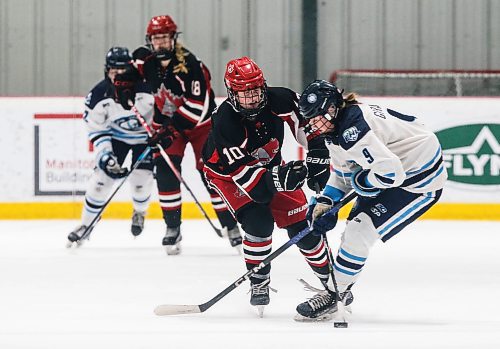 JOHN WOODS / WINNIPEG FREE PRESS
Thompson-Okanagan Lakers&#x2019; Felicia Girardo (9) plays against Winnipeg Avros&#x2019; Sydney Haggart (10) in the final of the Female World Sport Challenge in Winnipeg Sunday, January  28, 2024. 

Reporter: josh