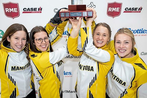BROOK JONES / WINNIPEG FREE PRESS
Team Lawes from the Fort Rouge Curling Club earned a 9-8 victory over Team Peterson from the Assiniboine Memorial Curling Club in the final of 2024 Manitoba Women's Curling Championships - Scotties Tournament of Hearts presented by Rocky Mountain Equipment at the Access Event Centre in Morden, Man., Sunday, Jan. 28, 2024. Pictured: Team Lawes hoist the Manitoba Provincial Champions trophy. Left to Right: Skip Kailtyn Lawes, third Selena Njejovan, second Jocelyn Peterman and lead Kristin MacCuish.