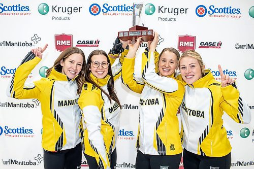 BROOK JONES / WINNIPEG FREE PRESS
Team Lawes from the Fort Rouge Curling Club earned a 9-8 victory over Team Peterson from the Assiniboine Memorial Curling Club in the final of 2024 Manitoba Women's Curling Championships - Scotties Tournament of Hearts presented by Rocky Mountain Equipment at the Access Event Centre in Morden, Man., Sunday, Jan. 28, 2024. Pictured: Team Lawes hoisting the Manitoba Provincial Champions trophy. Left to Right: Skip Kailtyn Lawes, third Selena Njejovan, second Jocelyn Peterman and lead Kristin MacCuish.