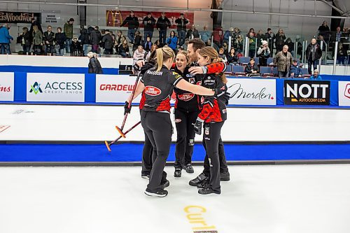 BROOK JONES / WINNIPEG FREE PRESS
Team Lawes from the Fort Rouge Curling Club earned a 9-8 victory of Team Peterson from the Assiniboine Memorial Curling Club in final of 2024 Manitoba Women's Curling Championships - Scotties Tournament of Hearts presented by Rocky Mountain Equipment at the Access Event Centre in Morden, Man., Sunday, Jan. 28, 2024. Pictured: Team Lawes curling coach Connor Njejovan congratulates skip Kaitlyn Lawes, third Selena Njejovan, second Jocelyn Peterman and lead Kristin MacCuish.