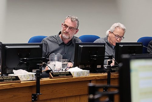 Coun. Bruce Luebke (Ward 6) and Coun. Glen Parker (Ward 9) listen to a presentation about community grant requests in council chambers during the City of Brandon's pre-budget session Monday evening. (Michele McDougall/The Brandon Sun).