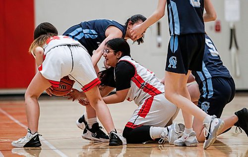 JOHN WOODS / WINNIPEG FREE PRESS
University of Winnipeg Wesmen&#x2019;s Umme Mani Ali (5) passes to teammate Memphis Clarke (44) as they play Grey Academy Raiders in Winnipeg high school varsity basketball at University of Winnipeg Monday, January  29, 2024. 

Reporter: standup