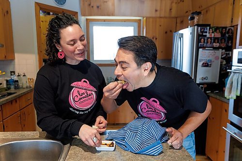 MIKE DEAL / WINNIPEG FREE PRESS
Helena and Eduardo Morales taste test a fresh batch of tortilla&#x2019;s and homemade salsa.
Helena and Eduardo Morales, owners of Los Comales Morales, an artisan tortilla business. 
Helena and Eduardo are both of Mexican descent, she grew up in Manitoba, while Eduardo moved here from Mexico City in 2006, after the two of them met through a friend. 
Eduardo missed the taste of authentic, corn tortillas so he bought an industrial tortilla maker in 2018, and began ordering non-GMO, organic corn flour from a distributor in Iowa, expressly to make tortillas for family and friends. But since he was required to buy one ton of flour, per order, he started thinking maybe others would enjoy their tortillas, too; the business launched in August, 2023.
240130 - Tuesday, January 30, 2024.
