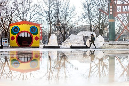 MIKAELA MACKENZIE / WINNIPEG FREE PRESS

Laura Neufeld walks past the closed (and partially melted) canopy rink at The Forks on Tuesday, Jan. 30, 2024. For Malak story.
Winnipeg Free Press 2024.