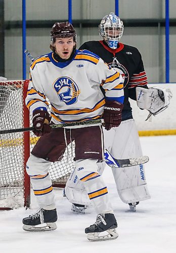 JOHN WOODS / WINNIPEG FREE PRESS
Justin Lies (10), Flin Flon player on team SJHL, on the ice with Steinbach and MJHL goaltender Cole Plowman (33) at the MJHL-SJHL Showcase in Winnipeg Tuesday, January 30, 2024. 

Reporter: mike