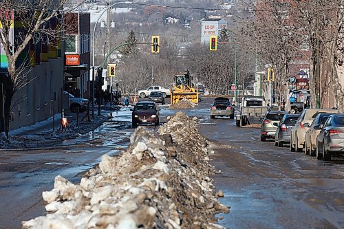 Snow is cleared from Seventh Street in downtown Brandon on an unseasonably warm Tuesday afternoon. Environment Canada says most of the Prairies are currently under an upper level ridge, which is associated with higher than normal temperatures. (Tim Smith/The Brandon Sun)