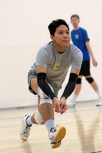 Libero Michael Flor chases down a ball during Bobcats practice on Wednesday. (Thomas Friesen/The Brandon Sun)