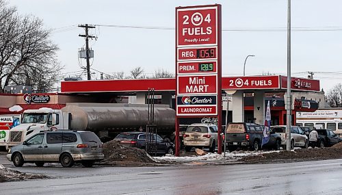 JOHN WOODS / WINNIPEG FREE PRESS
People line up for cheaper gas at this station on Salter St in Winnipeg Tuesday, January 30, 2024. 

Reporter: Carol