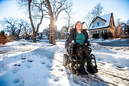 MIKAELA MACKENZIE / WINNIPEG FREE PRESS

Melissa Graham, executive director of the Manitoba League of Persons with Disabilities, on a difficult-to-navigate snowy and slushy sidewalk on Arlington Street on Wednesday, Jan. 31, 2024. Her group and others have a new Facebook site devoted to showing civic politicians and bureaucrats examples of bad sidewalk plowing.
Winnipeg Free Press 2024.