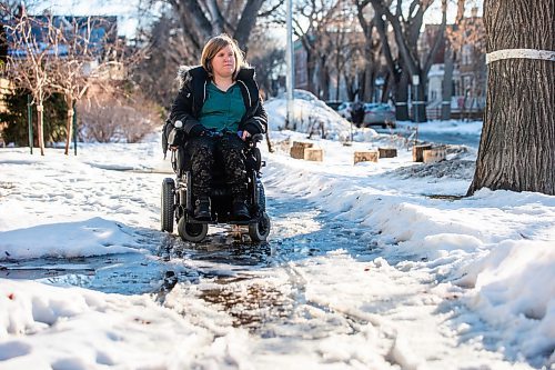 MIKAELA MACKENZIE / WINNIPEG FREE PRESS

Melissa Graham, executive director of the Manitoba League of Persons with Disabilities, on a difficult-to-navigate snowy and slushy sidewalk on Arlington Street on Wednesday, Jan. 31, 2024. Her group and others have a new Facebook site devoted to showing civic politicians and bureaucrats examples of bad sidewalk plowing.
Winnipeg Free Press 2024.