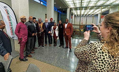 MIKE DEAL / WINNIPEG FREE PRESS
Members of the Black community gather for a photo at City Hall early Thursday morning during the Mayor&#x2019;s reception honouring Black History Month.
240201 - Thursday, February 01, 2024.
