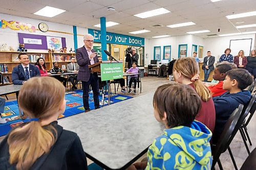 MIKE DEAL / WINNIPEG FREE PRESS
Education and Early Childhood Learning Minister Nello Altomare announces that the Manitoba government will be increasing operating funding for public schools by 3.4 per cent, an amount higher than the provincial inflation rate and supporting school divisions as they roll out a universal nutrition program, during a media conference under the watchful eyes of several grade 4 students at Joseph Teres School Thursday morning.
See Maggie Macintosh story
240201 - Thursday, February 01, 2024.