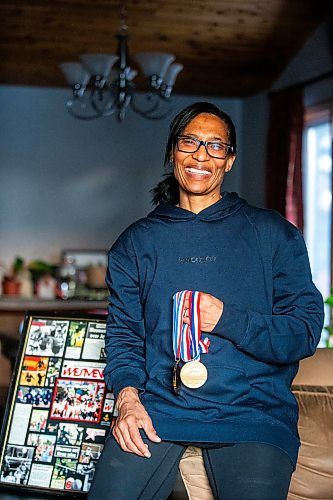 MIKAELA MACKENZIE / WINNIPEG FREE PRESS

Paulette Jerrard-Gillert, former volleyball player who won national championships at both the University of Winnipeg and University of Manitoba, with memorabilia from her time playing in her home on Friday, Feb. 2, 2024. For Taylor story.
Winnipeg Free Press 2024.