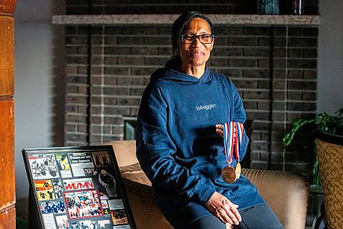 MIKAELA MACKENZIE / WINNIPEG FREE PRESS

Paulette Jerrard-Gillert, former volleyball player who won national championships at both the University of Winnipeg and University of Manitoba, with memorabilia from her time playing in her home on Friday, Feb. 2, 2024. For Taylor story.
Winnipeg Free Press 2024.