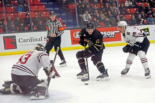 02022024
Caleb Hadland #10 of the Brandon Wheat Kings takes a shot on netminder Chase Wutzke #33 of the Red Deer Rebels as Rebels Quentin Bourne #28 looks on during WHL action at Westoba Place on Friday evening.
(Tim Smith/The Brandon Sun)