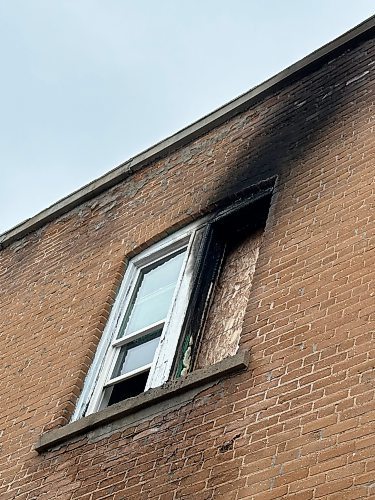 Firefighters were at a two-storey apartment building on the 200 block of Fountain Street around 7 p.m. Friday. (Katrina Clarke / Winnipeg Free Press)