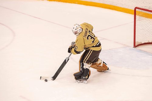 BROOK JONES / WINNIPEG FREE PRESS
The University of Manitoba Bisons host the visiting MacEwan University Griffins in Canada West men's hockey action inside the Wayne Fleming Arena at the Max Bell Centre at the University of Manitoba Fort Garry campus in Winnipeg, Man., Saturday, Feb. 3, 2024. Pictured: Bisons goaltender Kolby Thornton (No. 30) plays the puck outside of his crease during first period action.