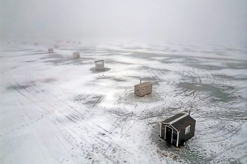 05022024
Ice-fishing shacks sit amidst the fog on Minnedosa Lake on an unseasonably warm Monday afternoon.
(Tim Smith/The Brandon Sun)