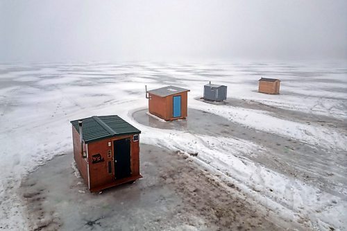 05022024
Ice-fishing shacks sit shrouded in fog on Minnedosa Lake on an unseasonably warm Monday afternoon.
(Tim Smith/The Brandon Sun)