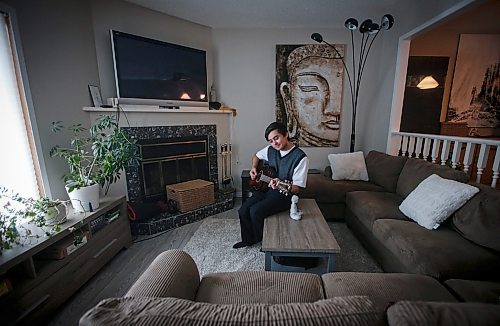 JOHN WOODS / WINNIPEG FREE PRESS
Local singer songwriter Ethan Lyric, who&#x2019;s songs have found some airplay on a digital music station and has been selected by Darkspark, which connects young musicians from around the world, is photographed in his home Monday, February 5, 2024.  

Reporter: alan