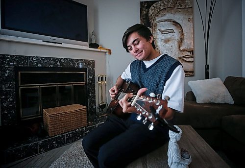 JOHN WOODS / WINNIPEG FREE PRESS
Local singer songwriter Ethan Lyric, who&#x2019;s songs have found some airplay on a digital music station and has been selected by Darkspark, which connects young musicians from around the world, is photographed in his home Monday, February 5, 2024.  

Reporter: alan